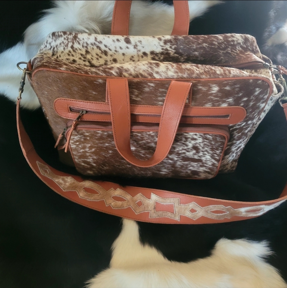 Weekender bag or briefcase hair on hide